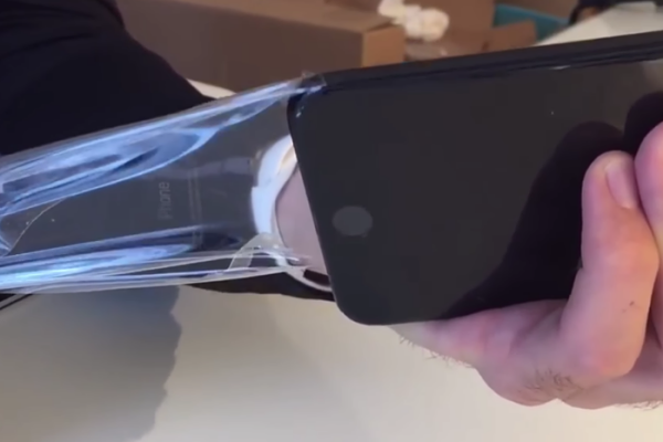 Full-Device Skins Causing 'iPhone' and Regulatory Labels to Peel Off Back of Jet Black iPhones
